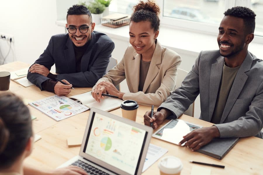 Professionals reviewing work together